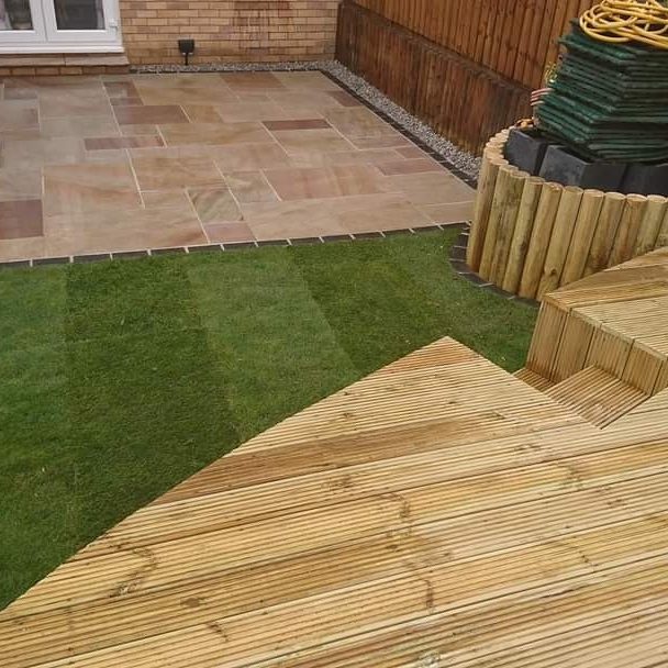 Artificial Grass and wooden decking area